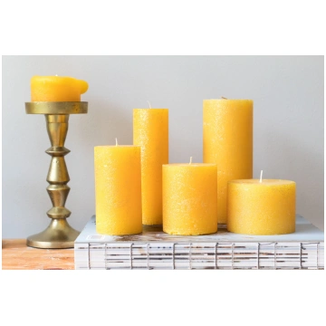 Set of candles, sun with golden shimmer