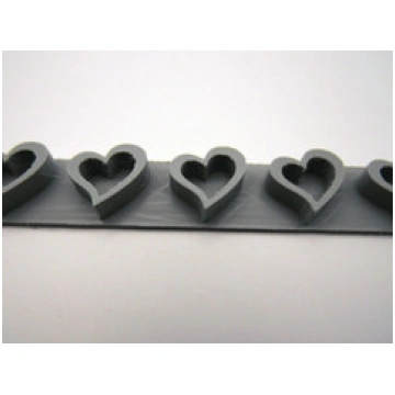 Slanted Open Heart border stamp for handbuild pott