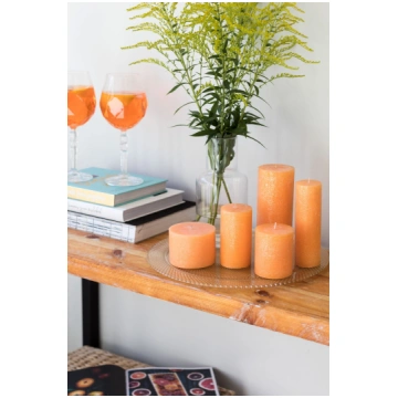 Set of candles, orange with golden shimmer